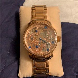 Men’s Akribos rose gold watch